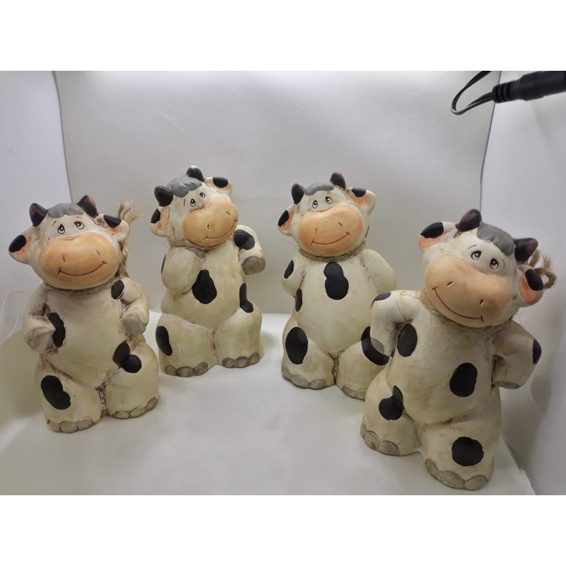 Mucche in biscotto decorate,   cm 8 x 6 x 13 .