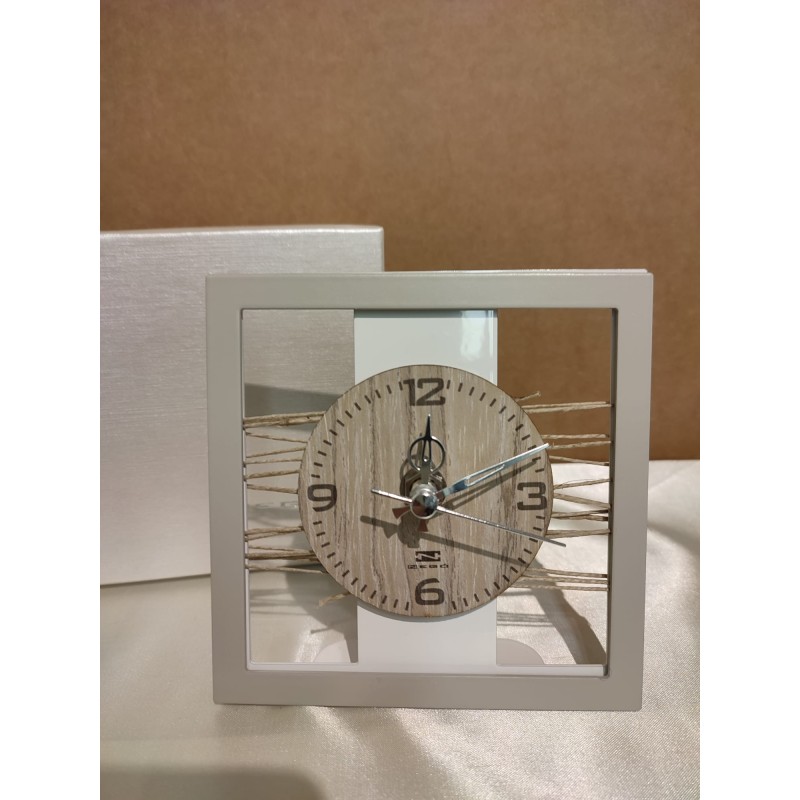 Orologio Negò, in metallo e legno e spago,  cm 13 x 13
